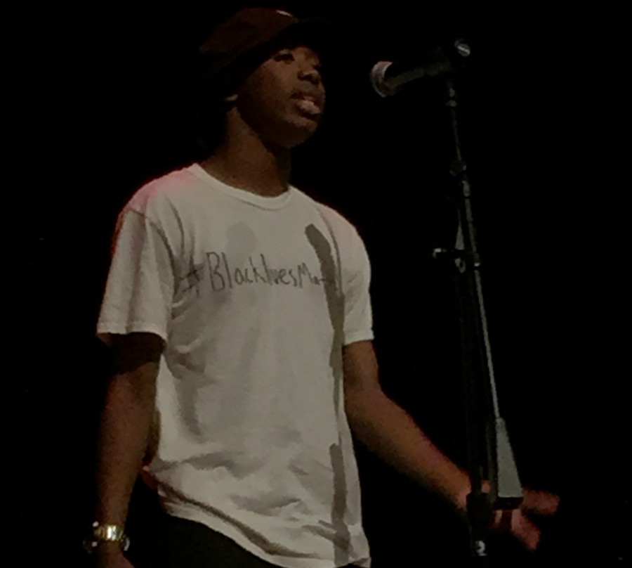 Student rapping at Cy Woods talent show