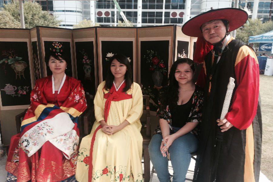 picture with traditionally dressed Korean family. 