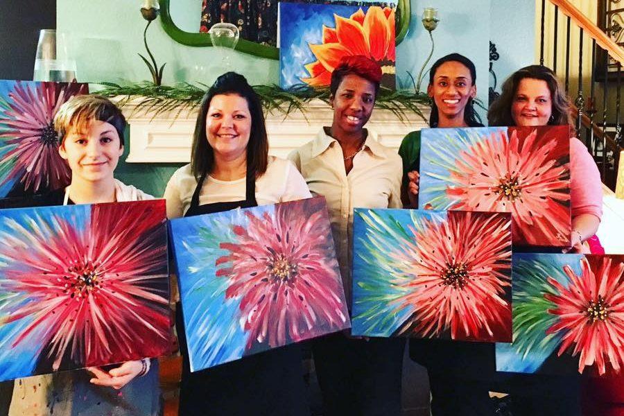 Katie Hughes on the far left with a painting party.
Provided by: Katie Hughes