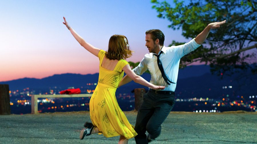 A shot of Ryan Gosling and Emma Stone dancing together.