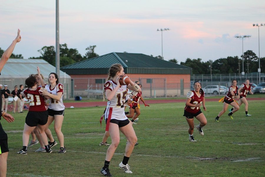 Senior Quarterback Paige Sebesta scans the field for an open receiver.