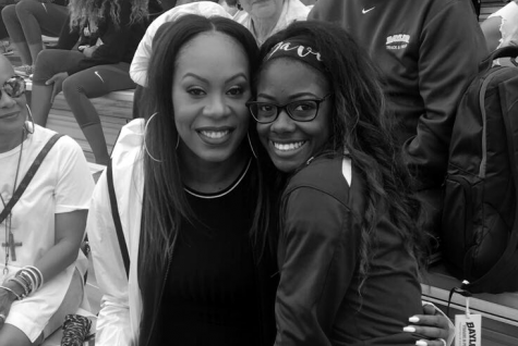 Deja Davis (right) poses with a Olympian Sanya Richards-Ross. 