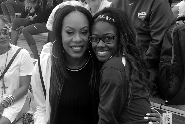 Deja Davis (right) poses with a Olympian Sanya Richards-Ross. 