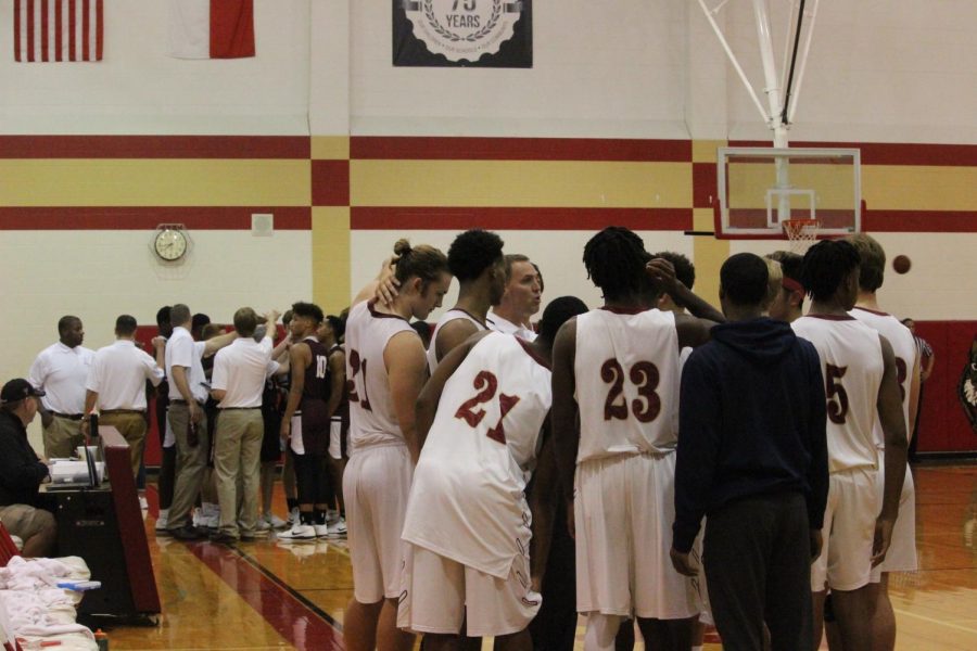 Wildcats huddle before the second quarter.