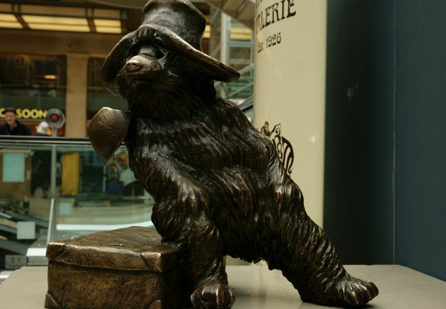 A statue of Paddington Bear from the beloved Paddington series at Paddington station in London.