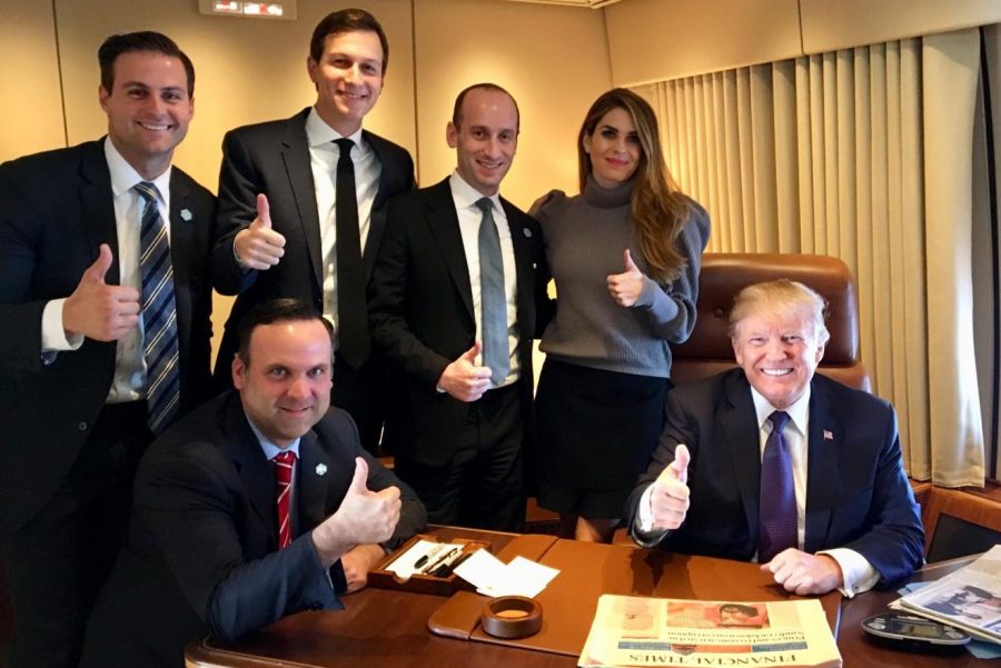Donald Trump with his staff and Hope Hicks (top right).