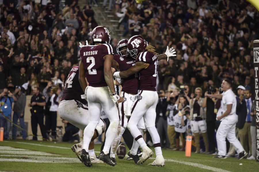 Aggie teammates celebrate after their LSU victory