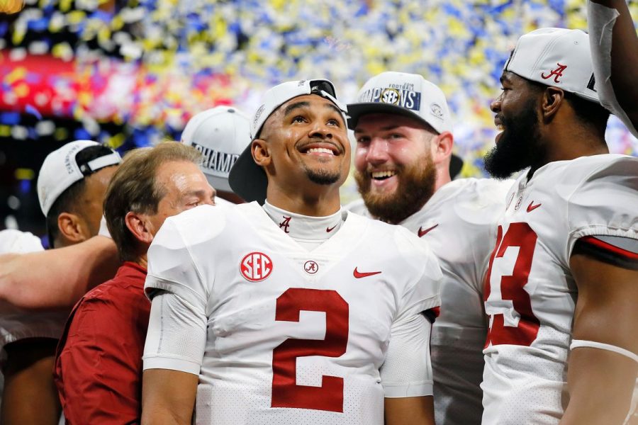 Jalen Hurts  celebrates after defeating the Georgia Bulldogs