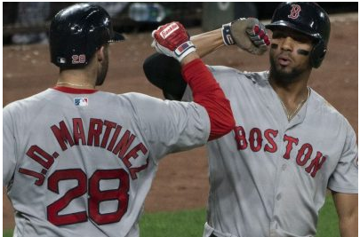 JD Martinez and Xander Bogaerts  celebrating