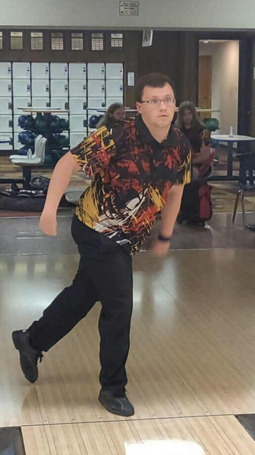 Senior Dakota Dudley rolling the bowling ball