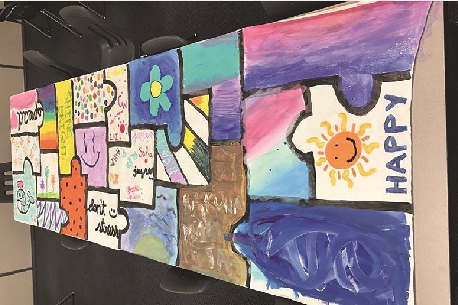 The puzzle piece poster made by students at Thursday's activity.