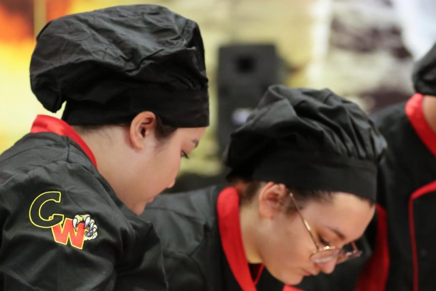 North Star members Berry and Berkiri cooking during the finals