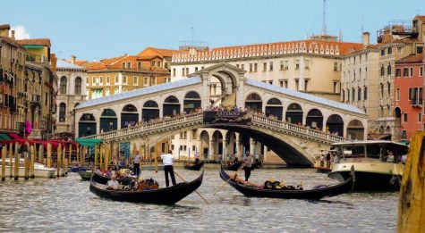 Gondolas sailing in Venice, Italy