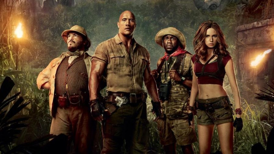 The characters Professor Oberon (Black), Dr. Bravestone (Johnson), Franklin Finbar (Hart) and Ruby Roundhouse (Gillan) ready to make their way through Jumanji.