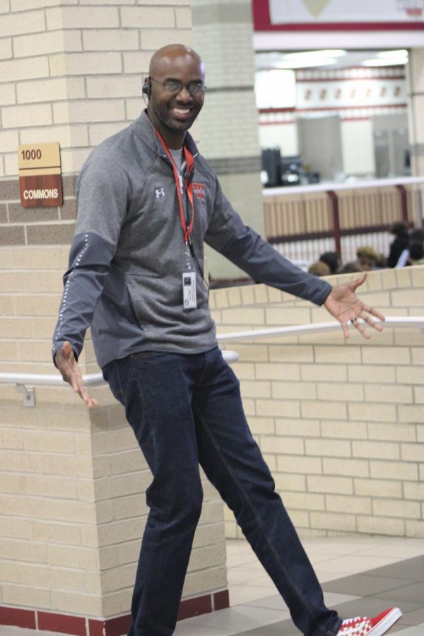 Assistant principal Dwight Williams hangs out in the Commons.