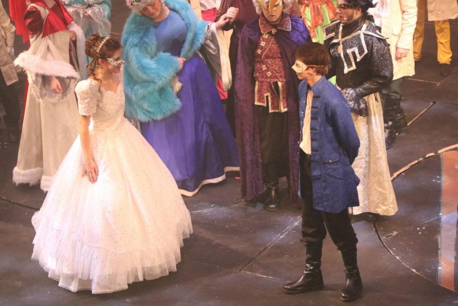 Senior Sarah Swift and Sophomore Ben Armstrong prepare to dance as Ella and Prince Topher.