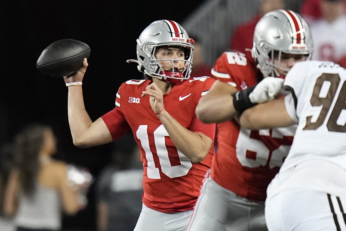 Sep 7, 2024; Columbus, Ohio, USA;  Ohio State Buckeyes quarterback Julian Sayin (10) throws a pass against the Western Michigan Broncos during the second half at Ohio Stadium.  Mandatory Credit: Adam Cairns-Imagn Images