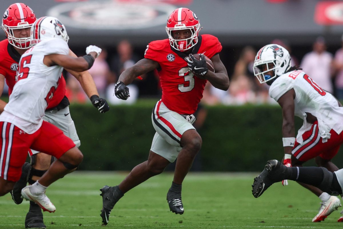 Sep 6, 2025; Athens, Georgia, USA; Georgia Bulldogs running back Nate Frazier (3) runs the ball against the Austin Peay Governors in the third quarter at Sanford Stadium. Mandatory Credit: Brett Davis-Imagn Images