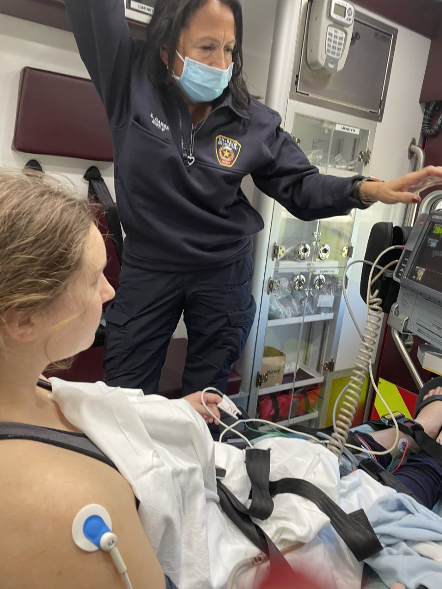 McGuire in an ambulance with her heart rate reading 284. 
Photo courtesy Megan McGuire